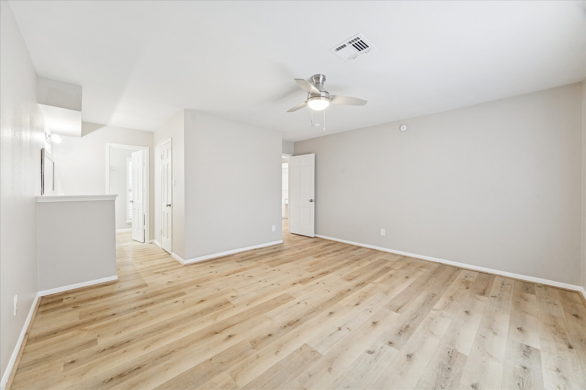 1502 Big Horn Drive Houston, TX 77090 - Photo 22 of 36 wooden floor in an empty room