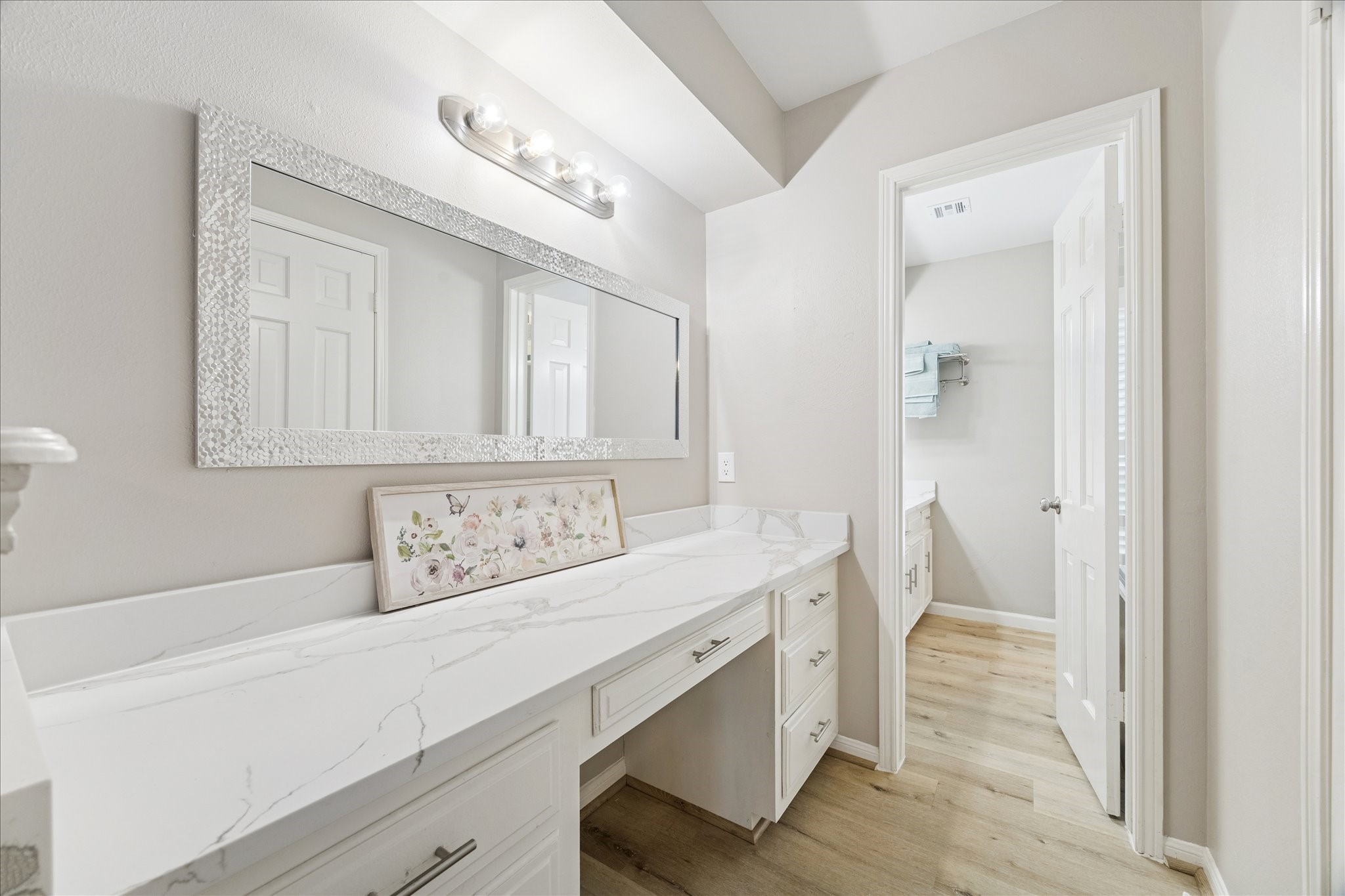 1502 Big Horn Drive Houston, TX 77090 - Photo 23 of 36 a bathroom with a sink and a mirror