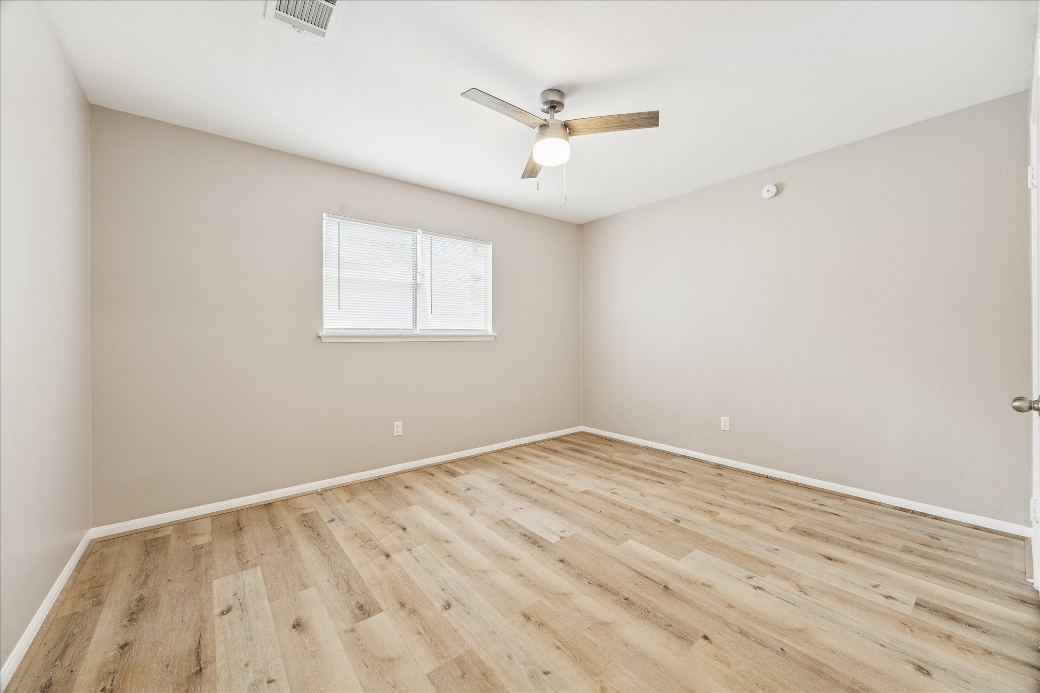1502 Big Horn Drive Houston, TX 77090 - Photo 32 of 36 a view of an empty room with a window