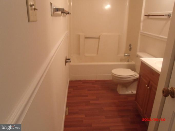 710 Planters Wharf Road Lusby, MD 20657 - Photo 14 of 16 a bathroom with a toilet and a shower