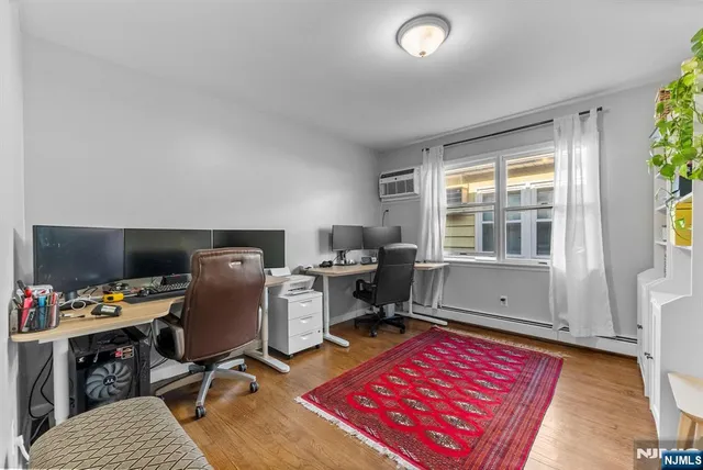 a workspace with furniture and a window