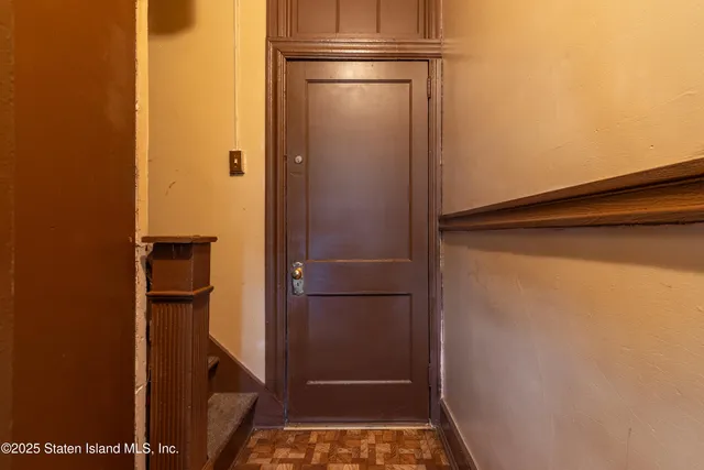 a bathroom with a glass door