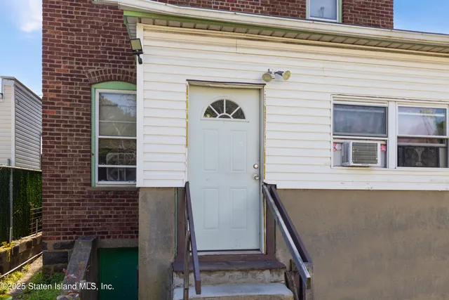 a view of a door and an outdoor space