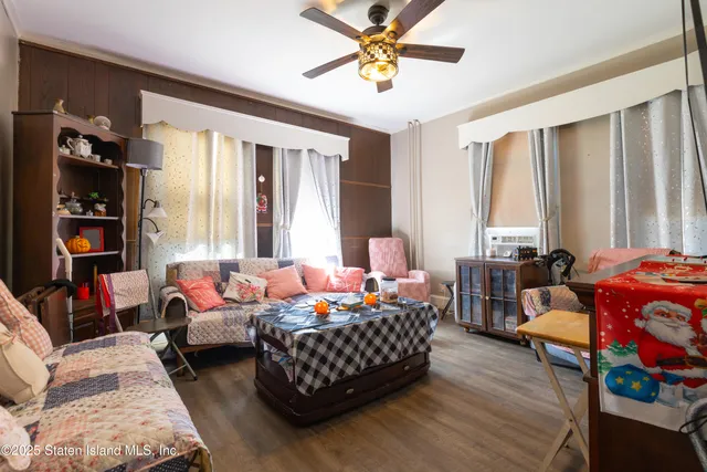 a bedroom with bed and a couch