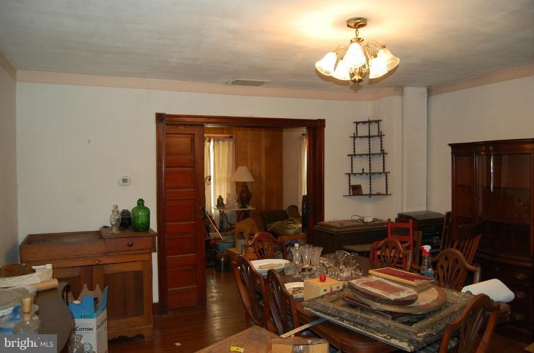 13508 Motters Station Road Rocky Ridge, MD 21778 - Photo 8 of 19 a view of a dining room with furniture window and wooden floor