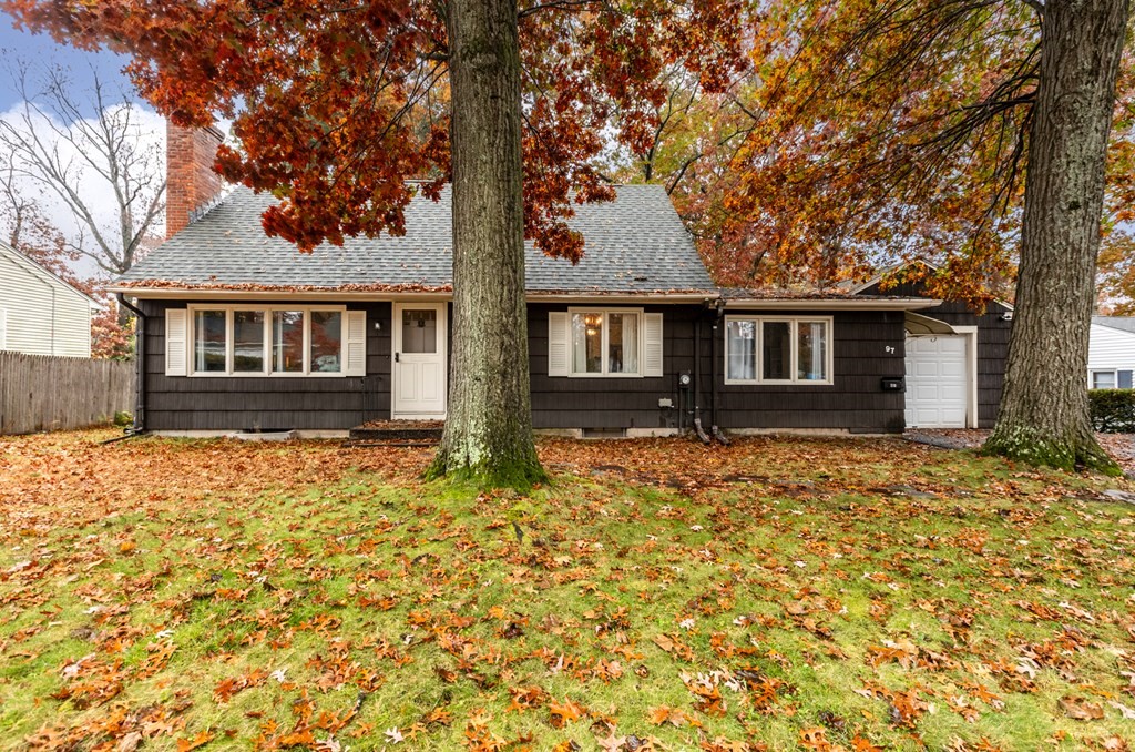97 Hadley Street Springfield, MA 01118 - Photo 1 of 37 front view of a house with a yard