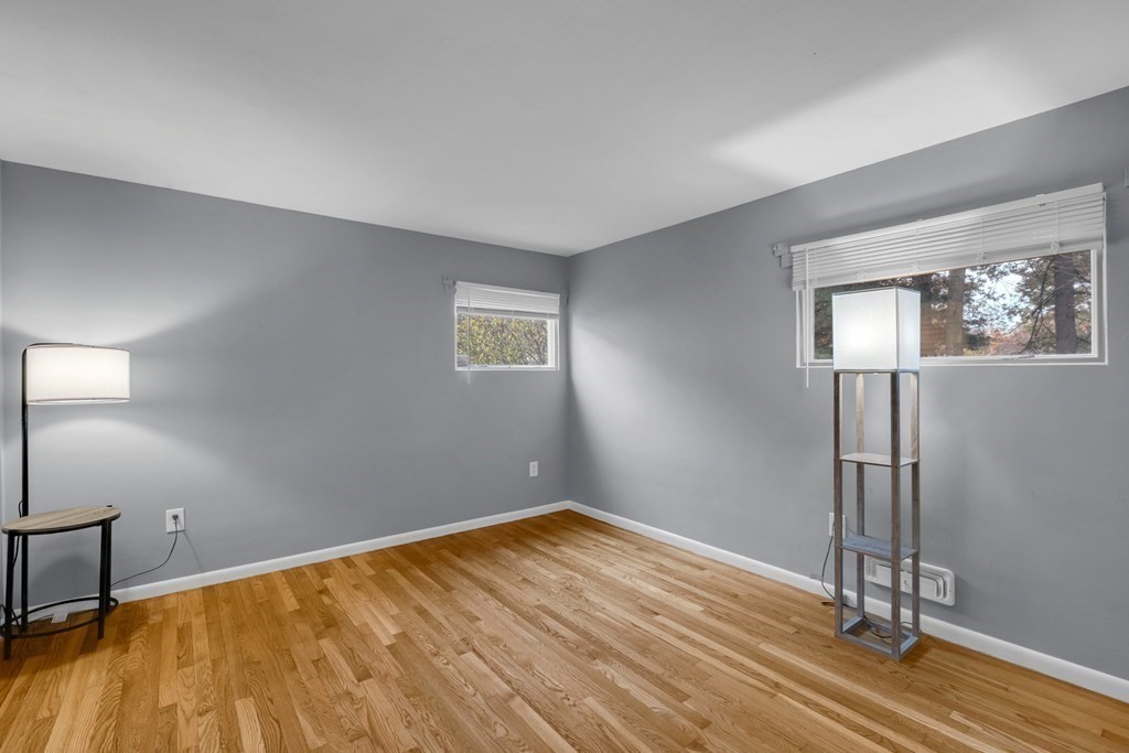 97 Hadley Street Springfield, MA 01118 - Photo 20 of 37 a view of empty room with wooden floor
