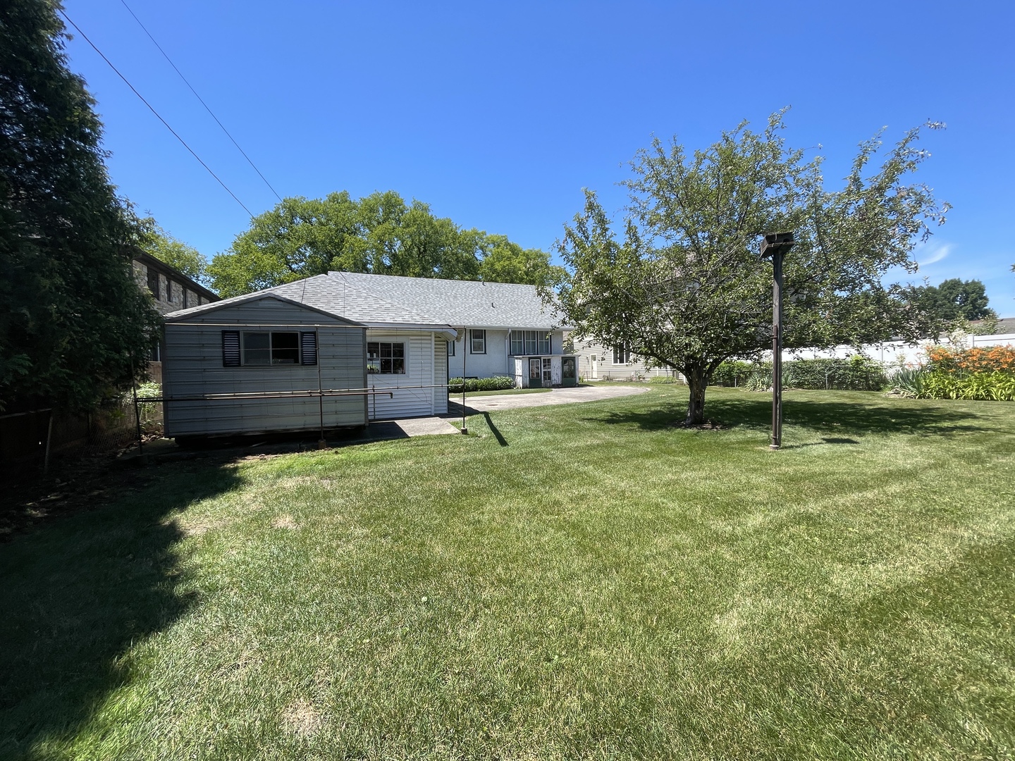 241 Oak Street Elmhurst, IL 60126 - Photo 2 of 4 a view of a house with a yard