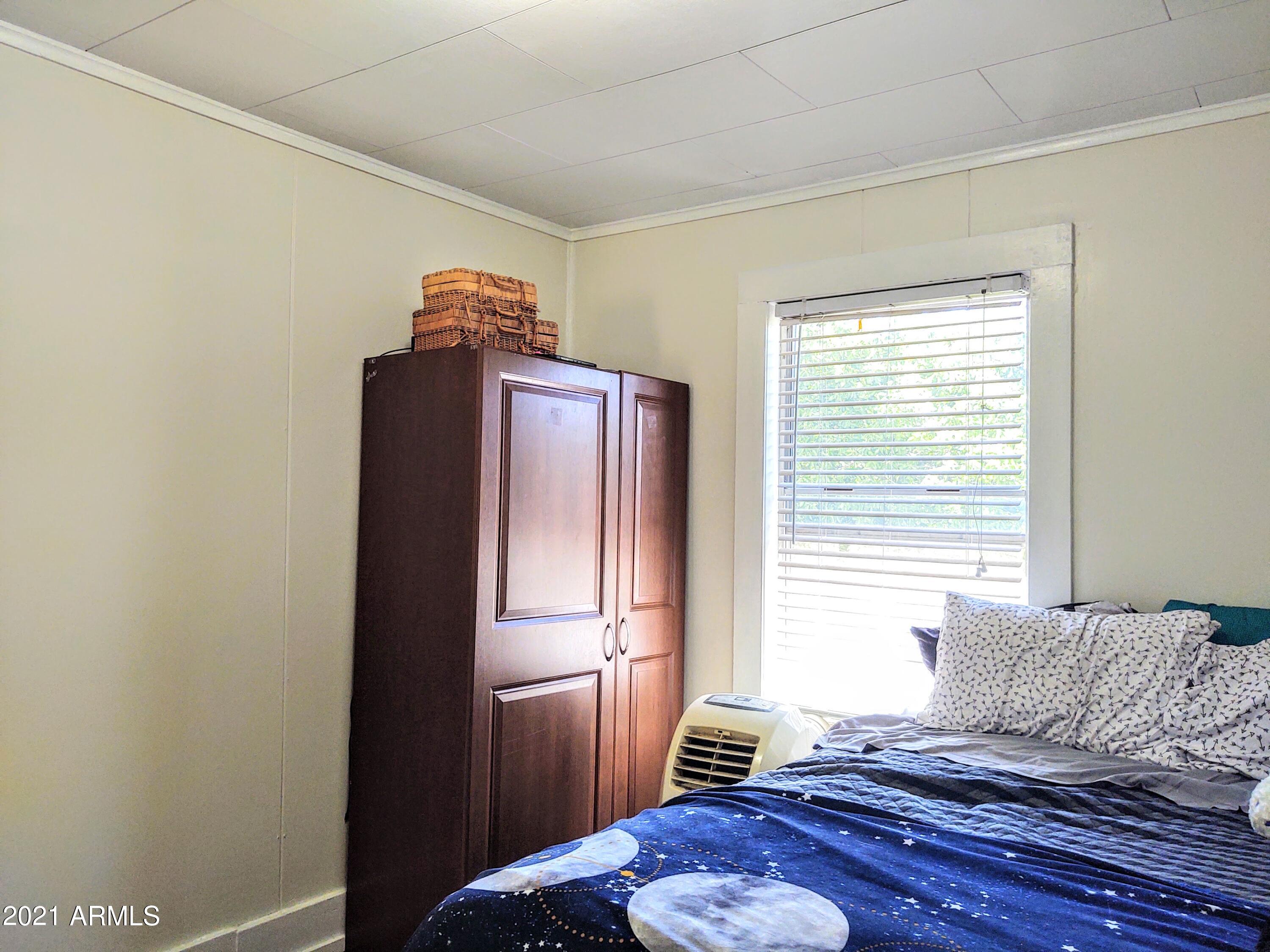 32 Old Douglas Road Bisbee, AZ 85603 - Photo 12 of 16 a living room with furniture and a window