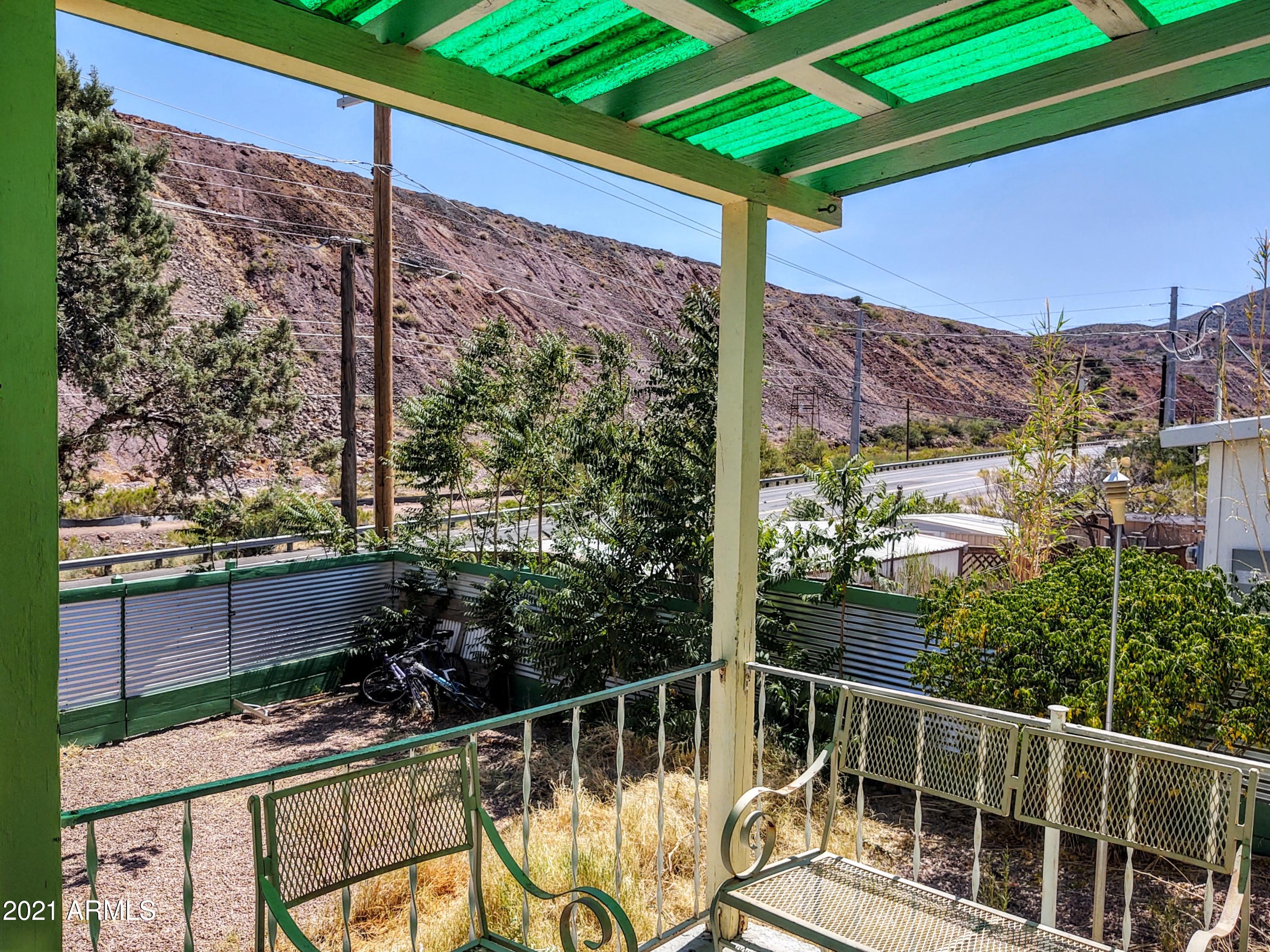 32 Old Douglas Road Bisbee, AZ 85603 - Photo 13 of 16 a view of balcony with a potted plant