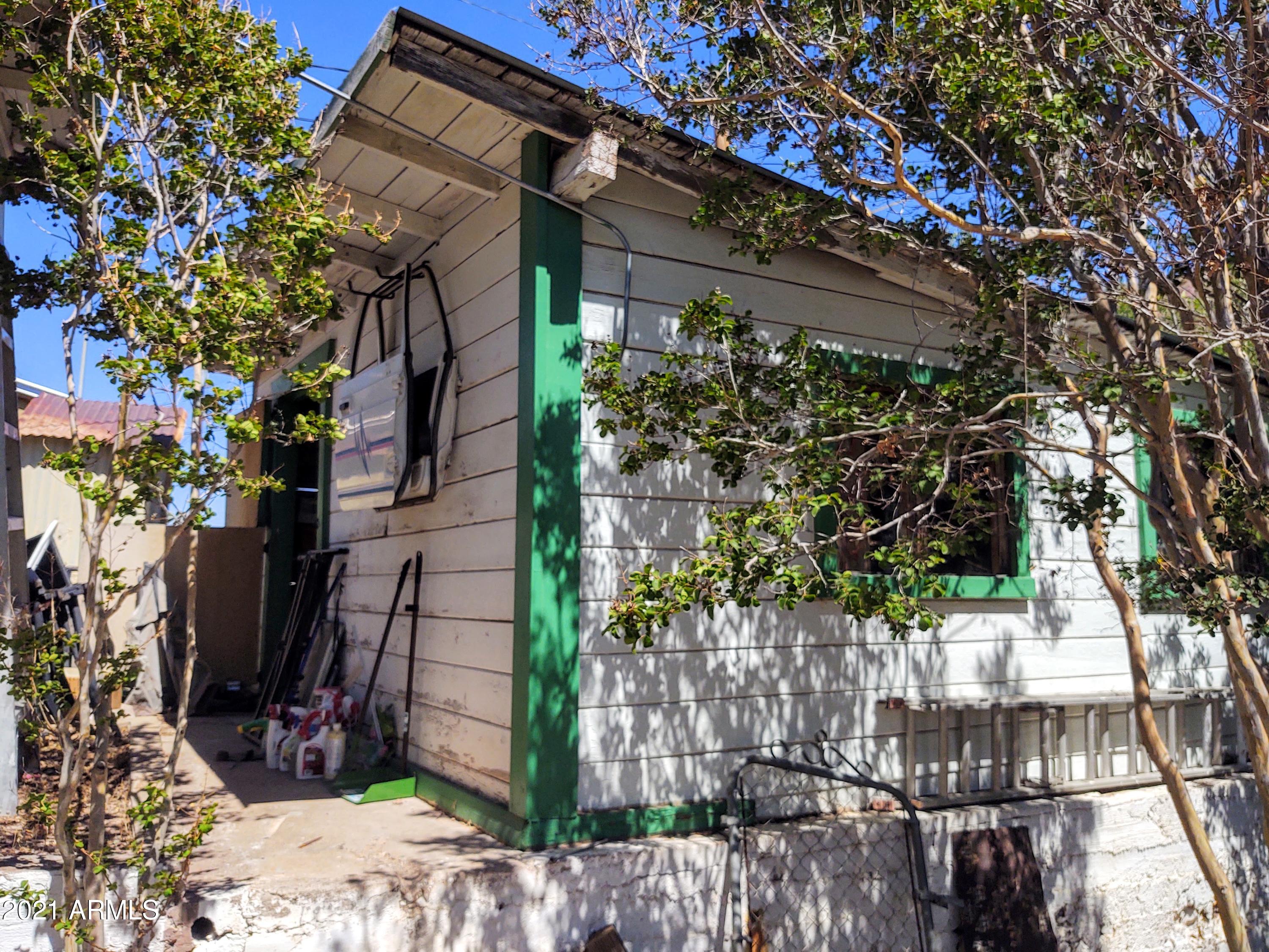 32 Old Douglas Road Bisbee, AZ 85603 - Photo 14 of 16 a backyard of a house with lots of green space