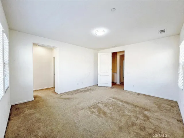 an empty room with window