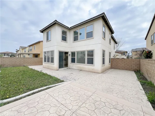 a house view with a garden space