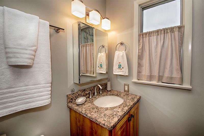 117 Foxglove Road Baden, PA 15005 - Photo 22 of 25 The Master Bath includes a tub and shower, and granite topped vanity.
