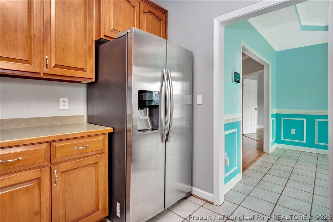 143 Pridgen Road Lumberton, NC 28358 - Photo 16 of 37 a kitchen with stainless steel appliances granite countertop a refrigerator and a stove