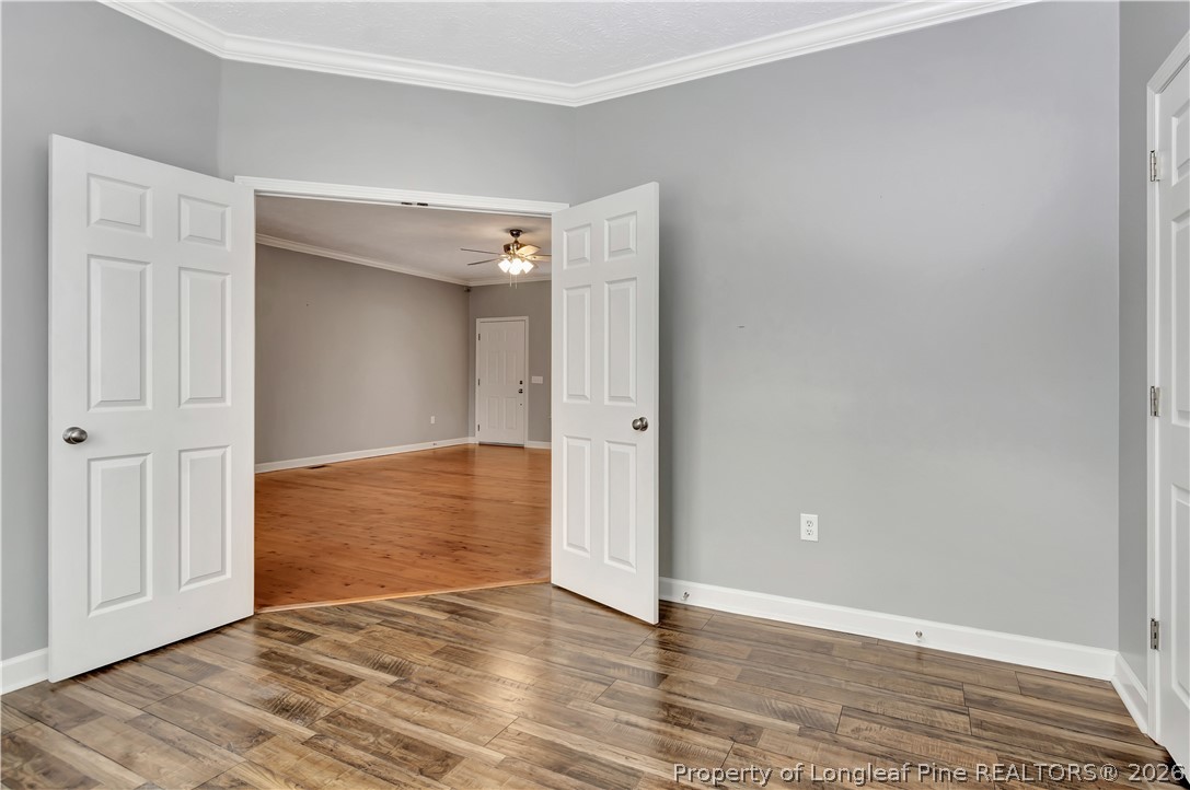 143 Pridgen Road Lumberton, NC 28358 - Photo 19 of 37 wooden floor in an empty room