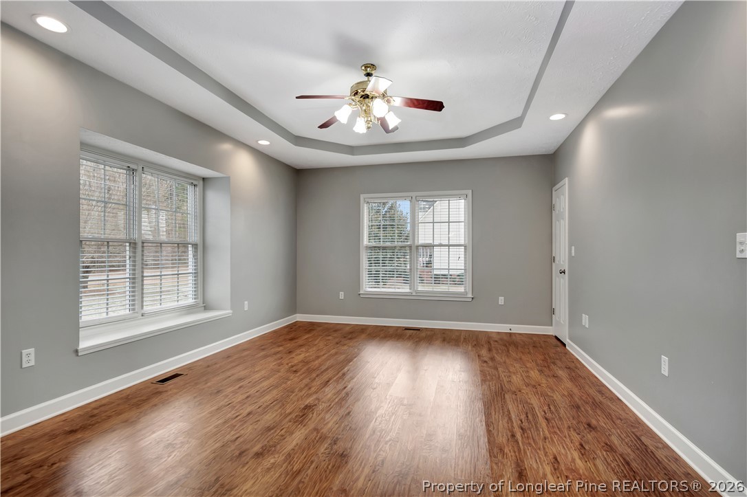 143 Pridgen Road Lumberton, NC 28358 - Photo 21 of 37 a view of an empty room with wooden floor and a window