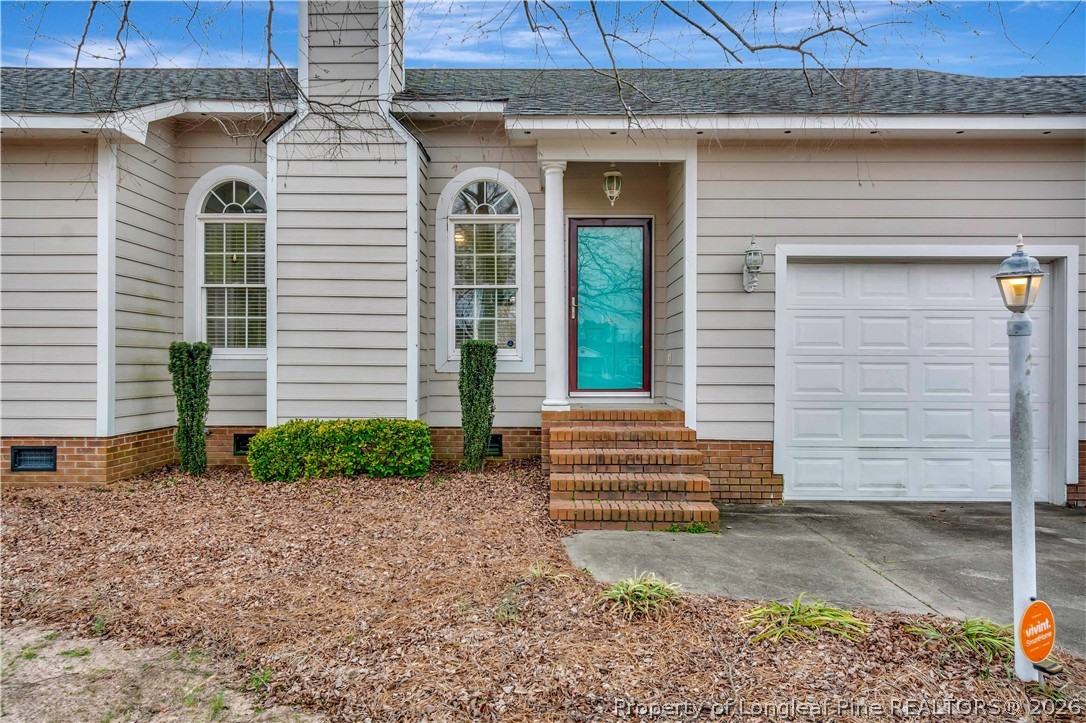 143 Pridgen Road Lumberton, NC 28358 - Photo 5 of 37 a front view of a house with a yard