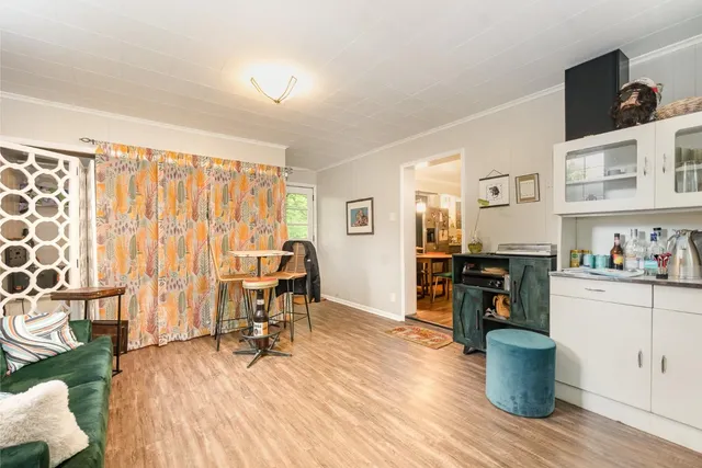 a view of a living room and dining room