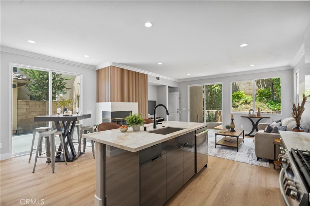 2129 Studio Drive Brea, CA 92821 - Photo 20 of 43 a room with furniture a large window and a table