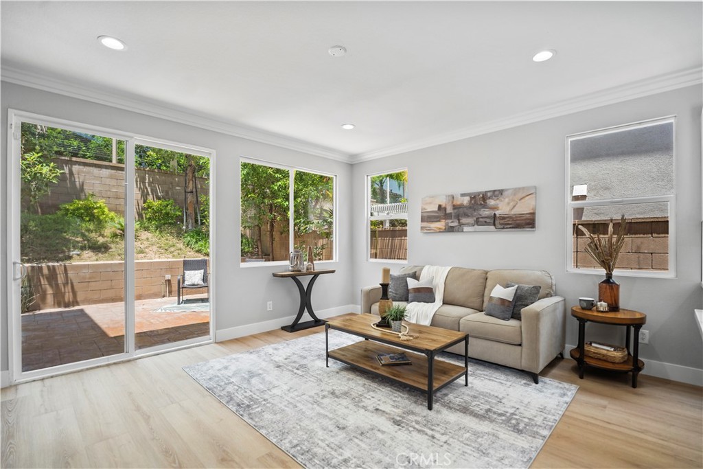 2129 Studio Drive Brea, CA 92821 - Photo 23 of 43 a living room with furniture and a large window