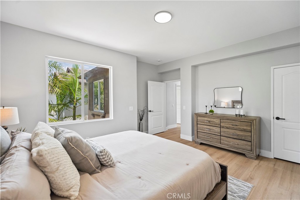 2129 Studio Drive Brea, CA 92821 - Photo 30 of 43 a bedroom with a bed and a window