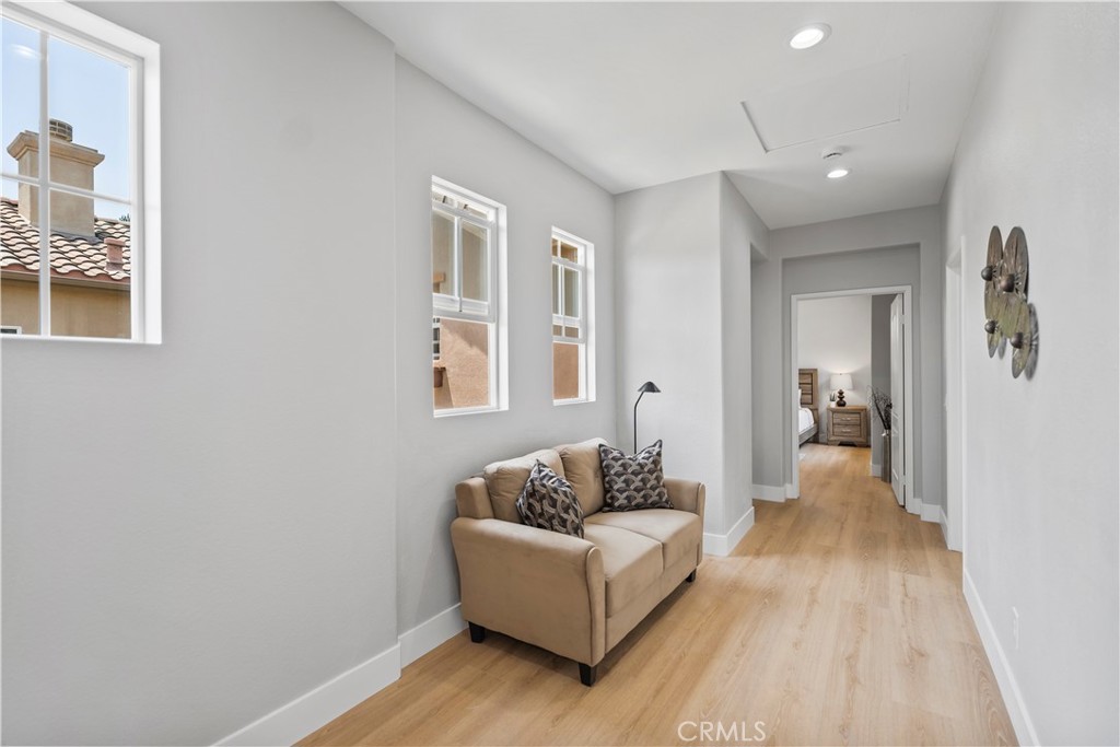 2129 Studio Drive Brea, CA 92821 - Photo 39 of 43 a living room with furniture and a wooden floor