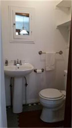 93 Morningside Road Worcester, MA 01602 - Photo 11 of 30 a bathroom with a sink toilet and a mirror