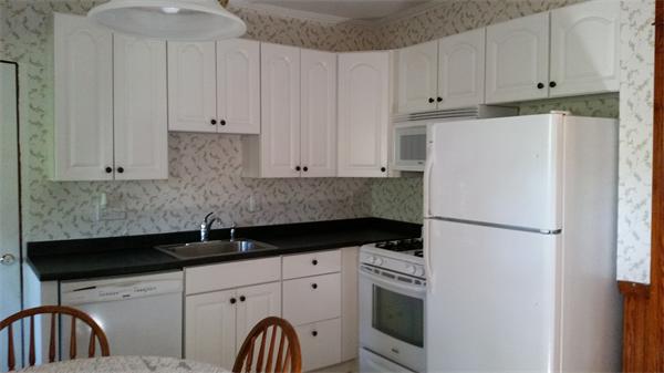 93 Morningside Road Worcester, MA 01602 - Photo 12 of 30 a kitchen with stainless steel appliances a refrigerator sink and cabinets