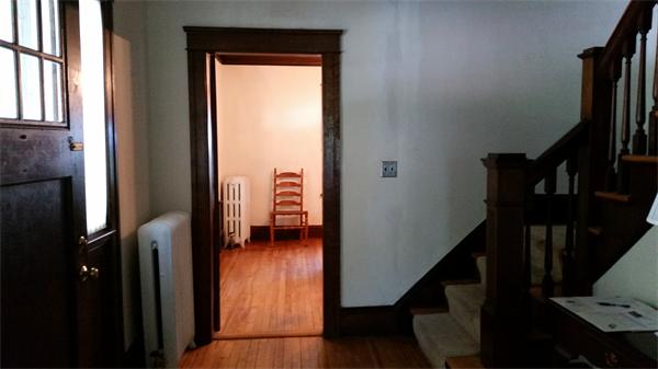 93 Morningside Road Worcester, MA 01602 - Photo 13 of 30 a view of a hallway with wooden floor and stairs