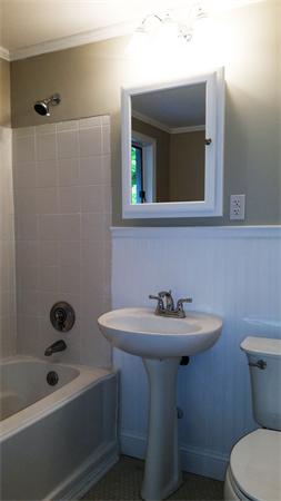 93 Morningside Road Worcester, MA 01602 - Photo 19 of 30 a bathroom with a sink mirror and toilet