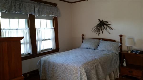 93 Morningside Road Worcester, MA 01602 - Photo 21 of 30 a bed sitting in a bedroom next to a window