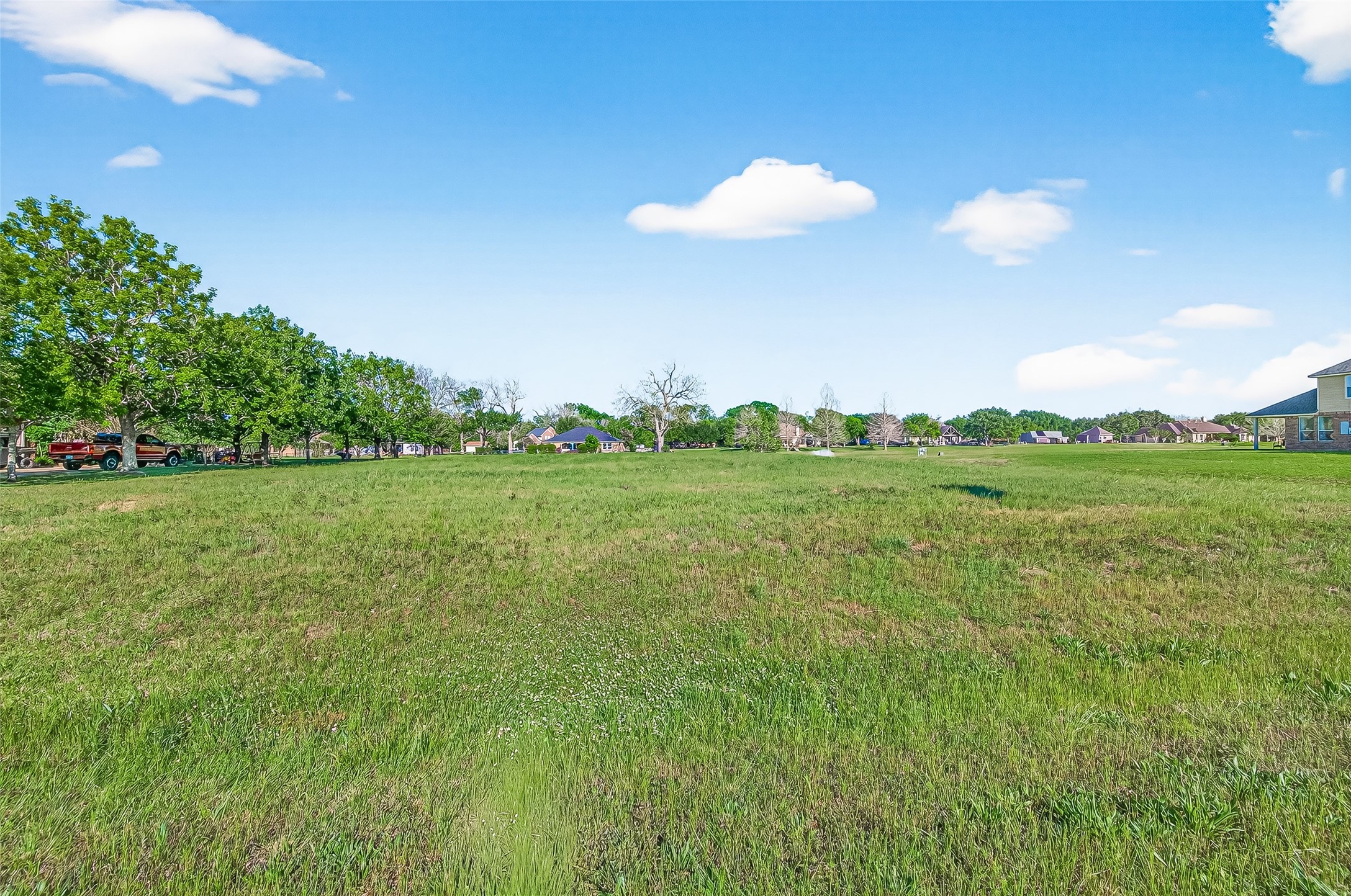 3510 River Ranch N Drive Rosenberg, TX 77471 - Photo 9 of 11 a view of a golf course with a lake