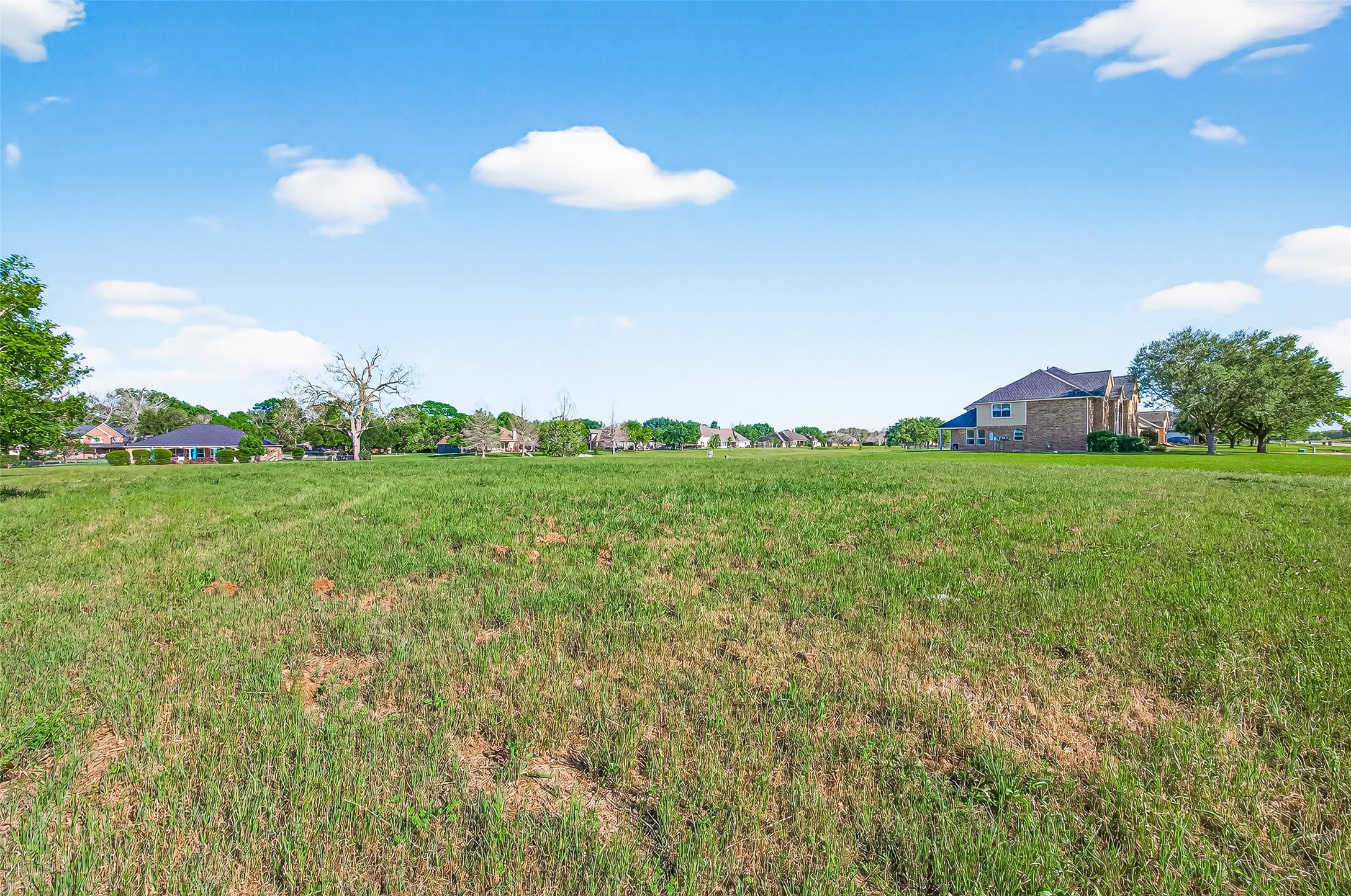 3510 River Ranch N Drive Rosenberg, TX 77471 - Photo 10 of 11 a view of a grassy field