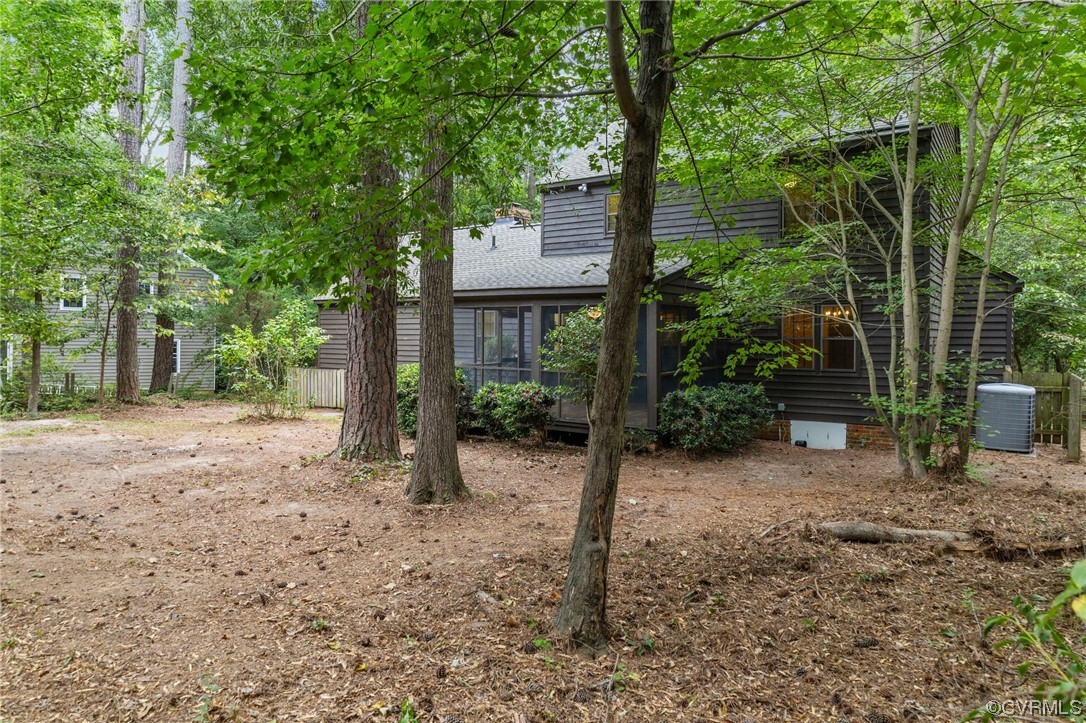 3917 Pebble Creek Road Midlothian, VA 23112 - Photo 17 of 50 View of yard with central AC