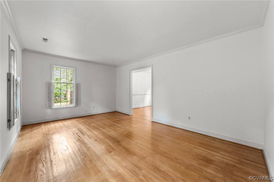 3917 Pebble Creek Road Midlothian, VA 23112 - Photo 24 of 50 Hardwood floored living room with crown molding