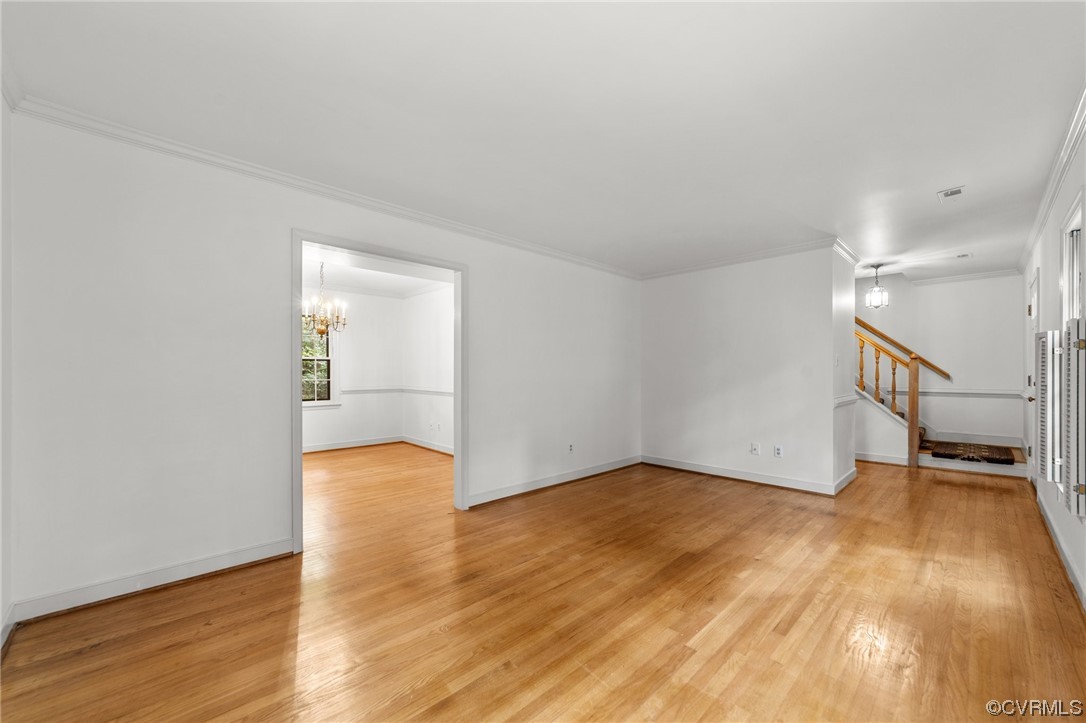 3917 Pebble Creek Road Midlothian, VA 23112 - Photo 25 of 50 Hardwood floored living room with crown molding