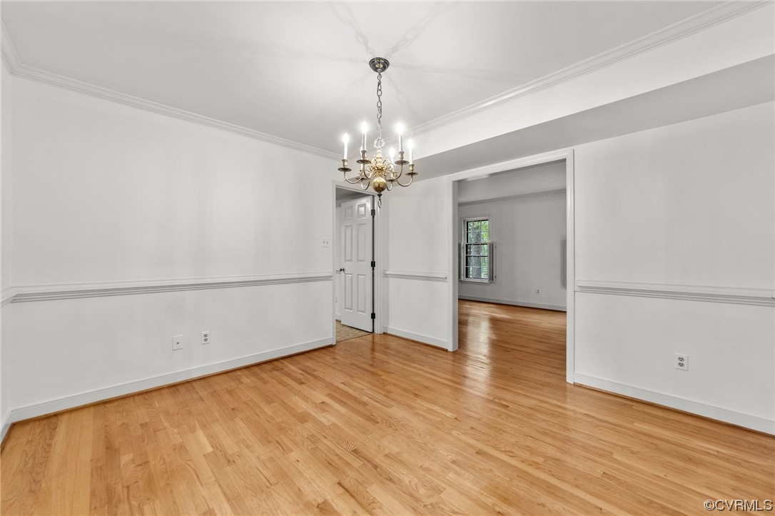 3917 Pebble Creek Road Midlothian, VA 23112 - Photo 28 of 50 Hardwood floored formal dining room with crown mol