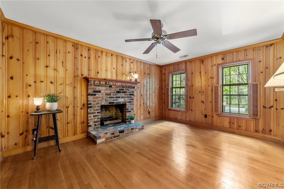 3917 Pebble Creek Road Midlothian, VA 23112 - Photo 35 of 50 Hardwood floored family room featuring crown moldi