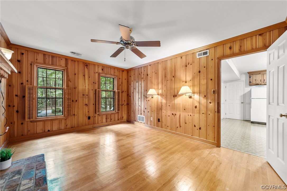 3917 Pebble Creek Road Midlothian, VA 23112 - Photo 36 of 50 Family room featuring crown molding, wood walls, l