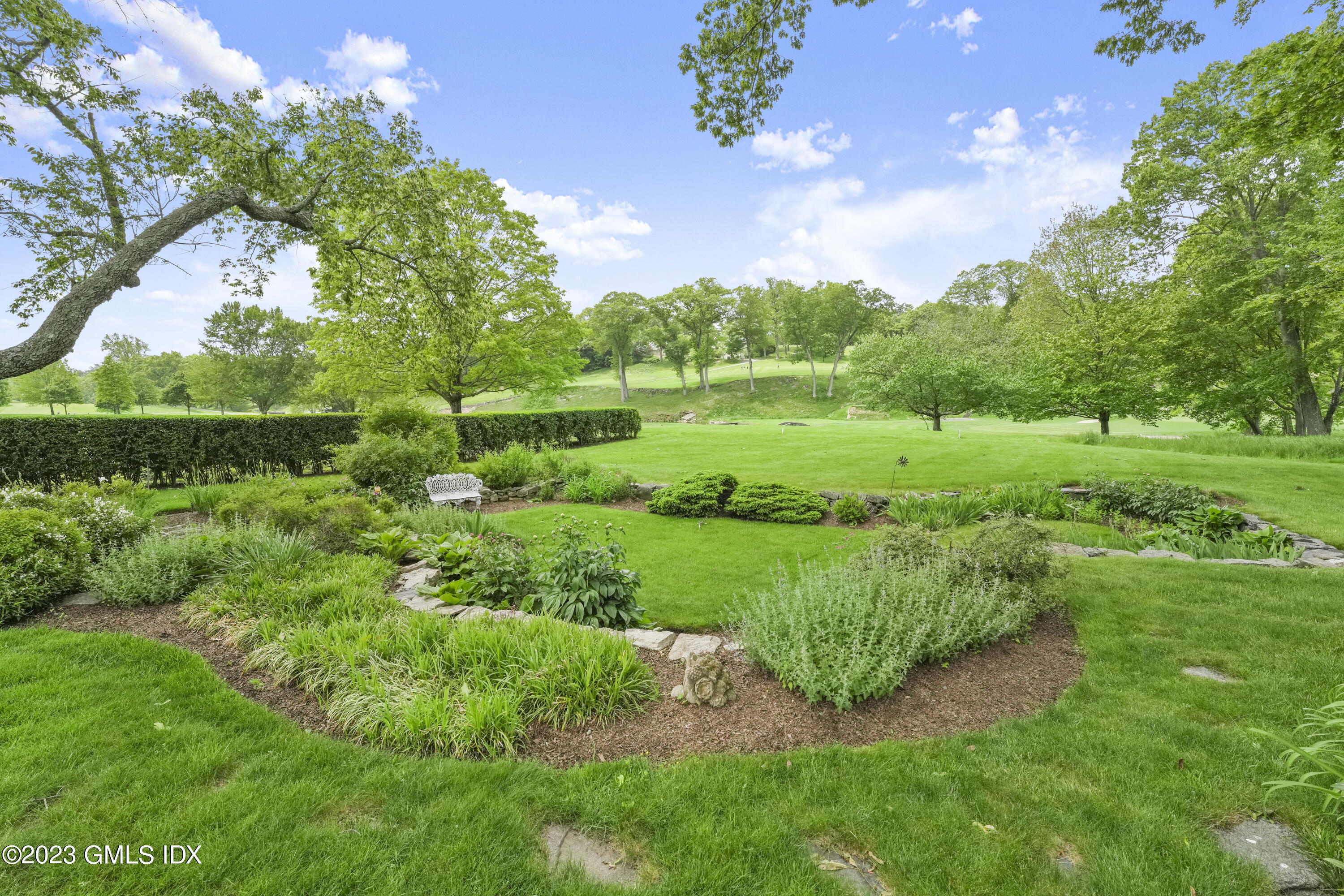 160 Stanwich Road Greenwich, CT 06830 - Photo 11 of 11 a view of a green field with lots of green space