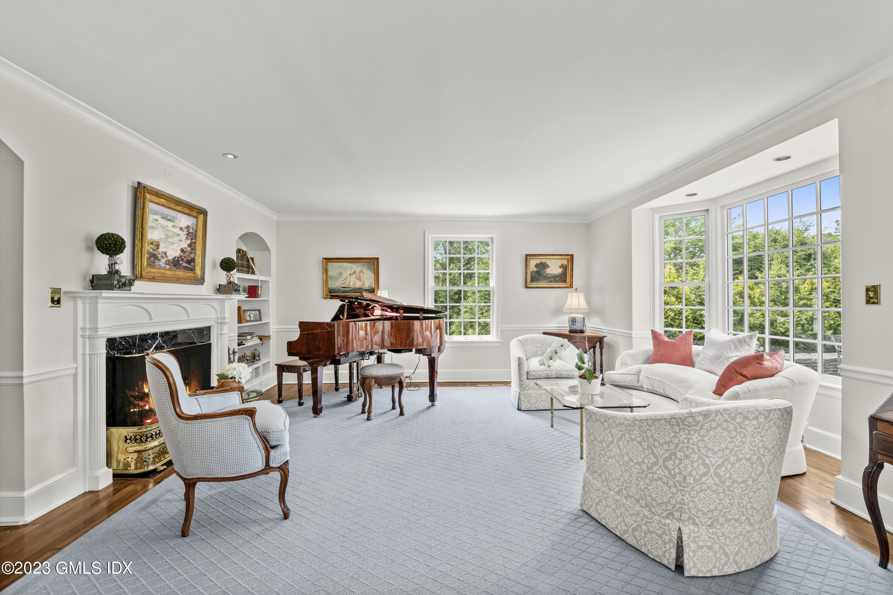 160 Stanwich Road Greenwich, CT 06830 - Photo 4 of 11 a living room with furniture and a fireplace