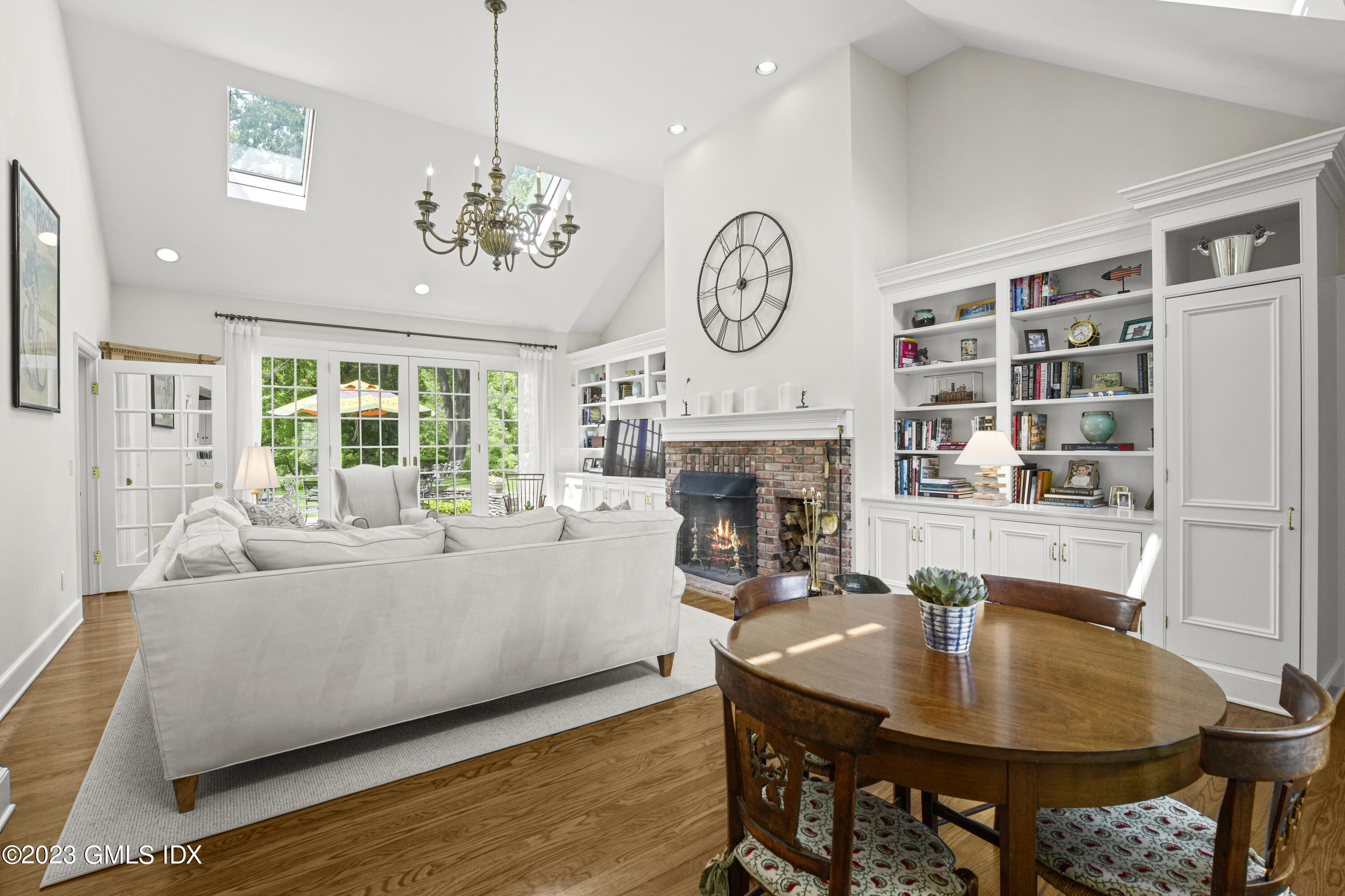 160 Stanwich Road Greenwich, CT 06830 - Photo 6 of 11 a living room with furniture a table and a fireplace