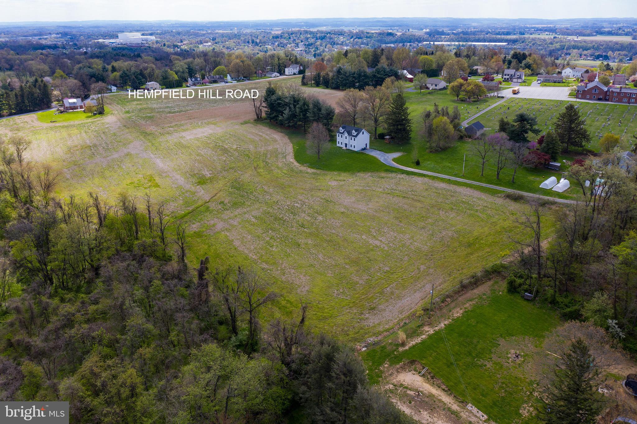 427 Hempfield Hill Road, Unit LOT # 2 Columbia, PA 17512 - Photo 5 of 10 an aerial view of residential houses with outdoor space and trees