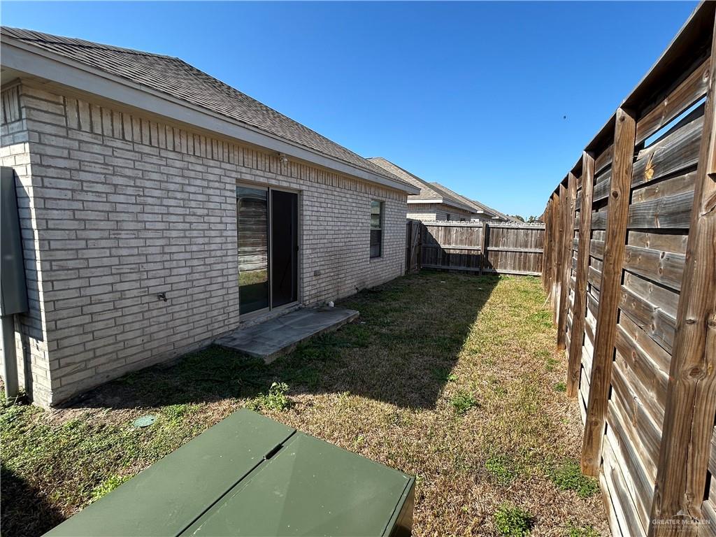 5608 Nightingale Avenue, Unit 2 Mission, TX 78573 - Photo 2 of 9 a view of a house with a yard