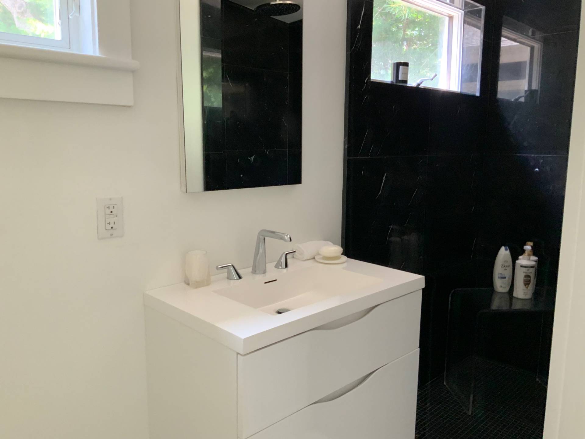61 Rutland Road East Hampton, NY 11937 - Photo 11 of 19 a bathroom with a sink and a mirror