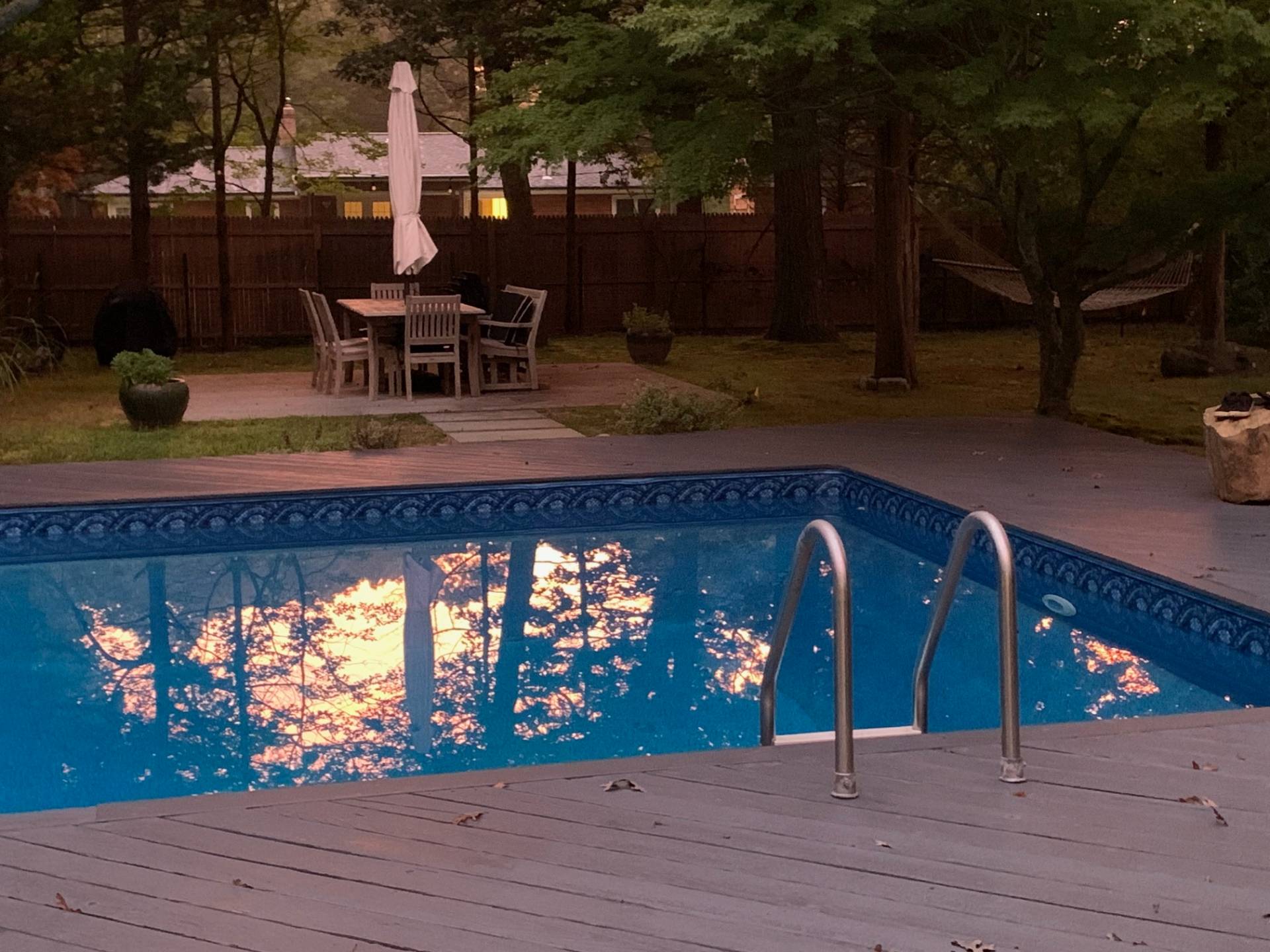 61 Rutland Road East Hampton, NY 11937 - Photo 16 of 19 a view of a chairs and tables in the patio