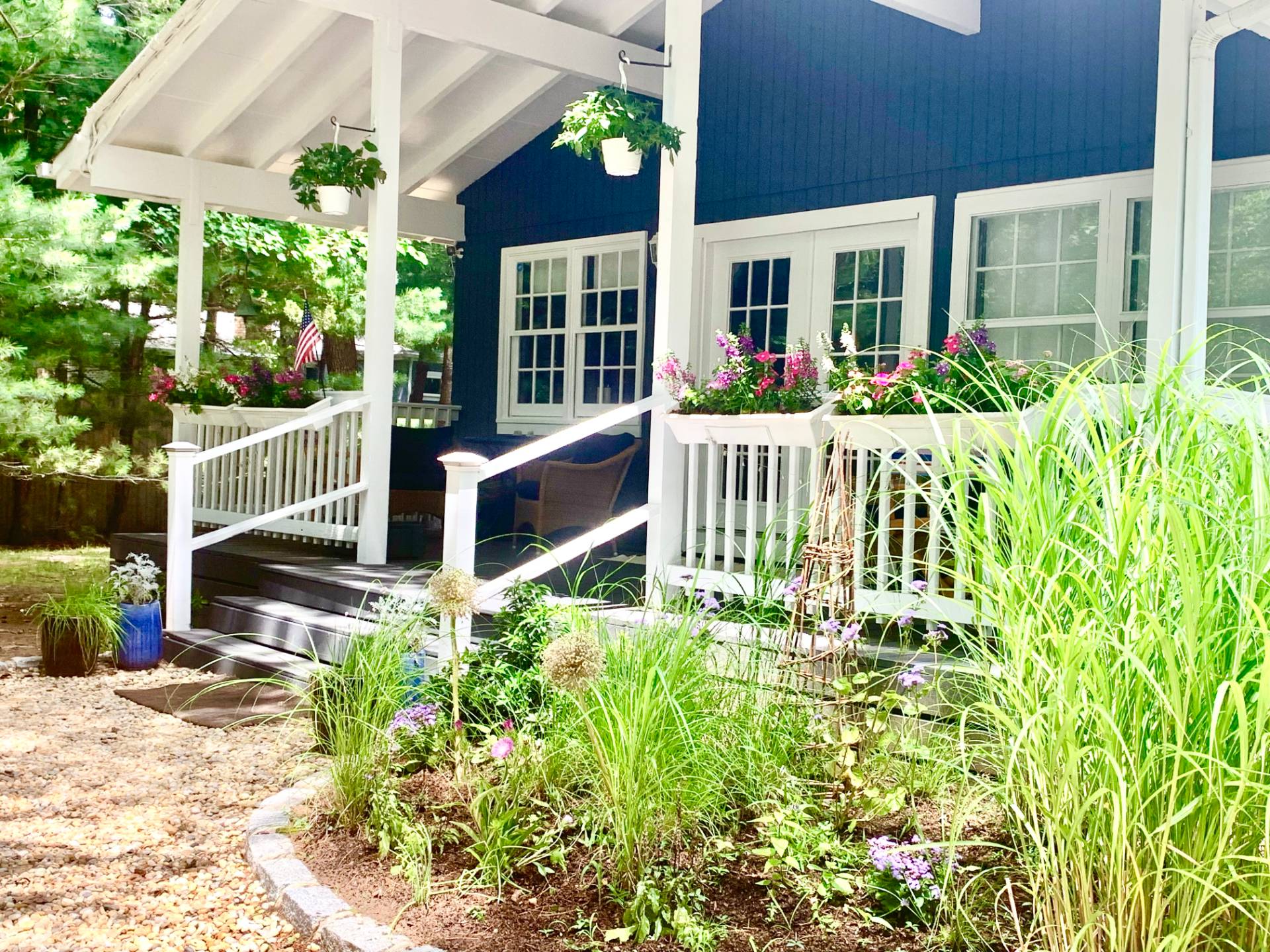 61 Rutland Road East Hampton, NY 11937 - Photo 19 of 19 a front view of a house with a garden