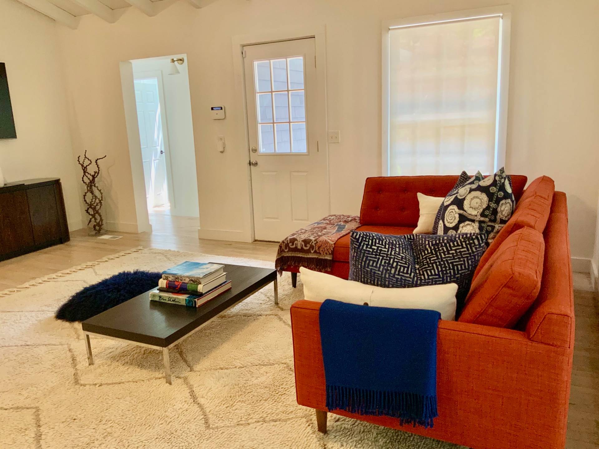 61 Rutland Road East Hampton, NY 11937 - Photo 4 of 19 a living room with furniture and a window
