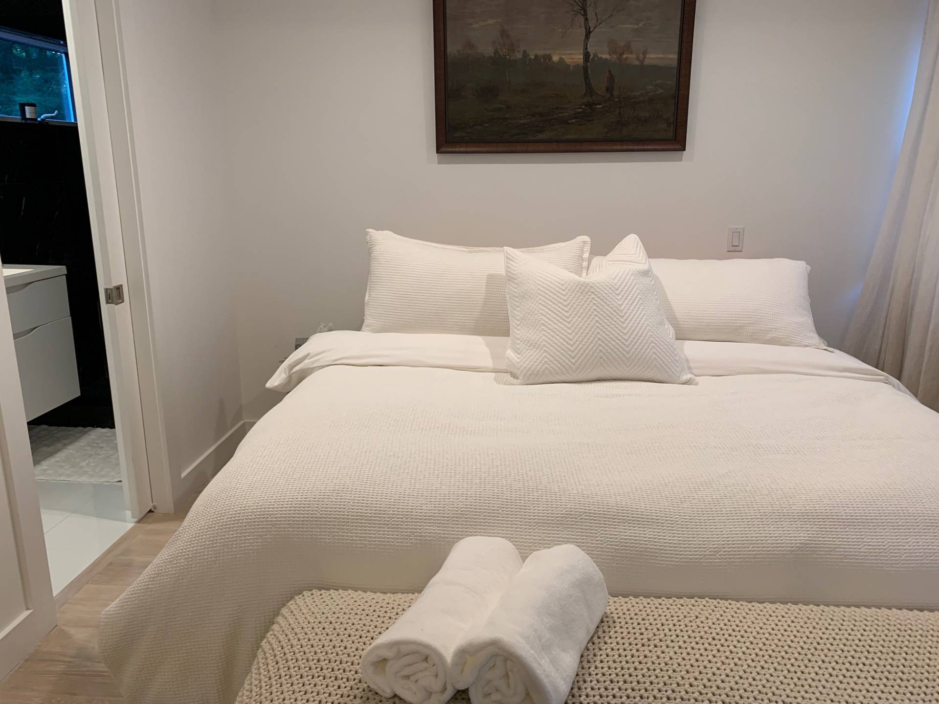 61 Rutland Road East Hampton, NY 11937 - Photo 9 of 19 a bedroom with a bed and couch